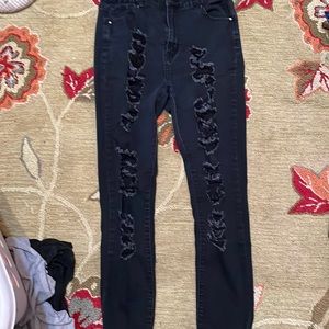 High rise black denim jeans with holes